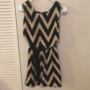 New without tag. Black and cream stripes with belt